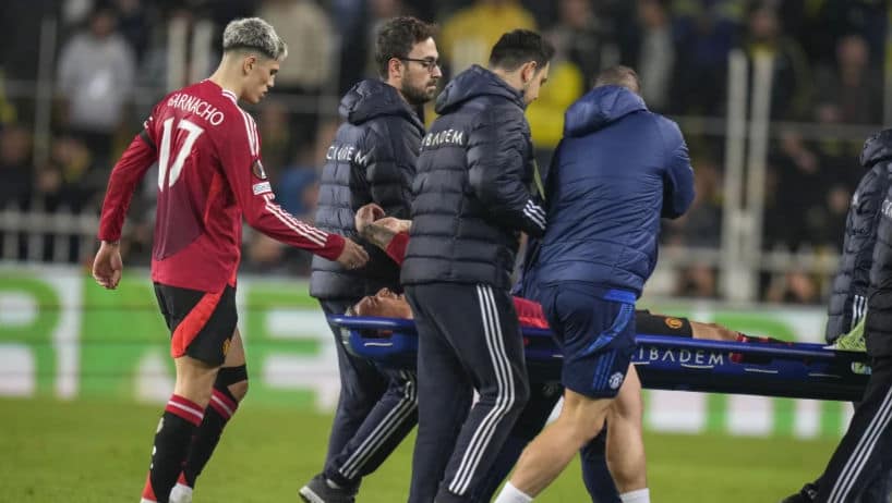 Manchester United winger Antony wearing protective boot after injury